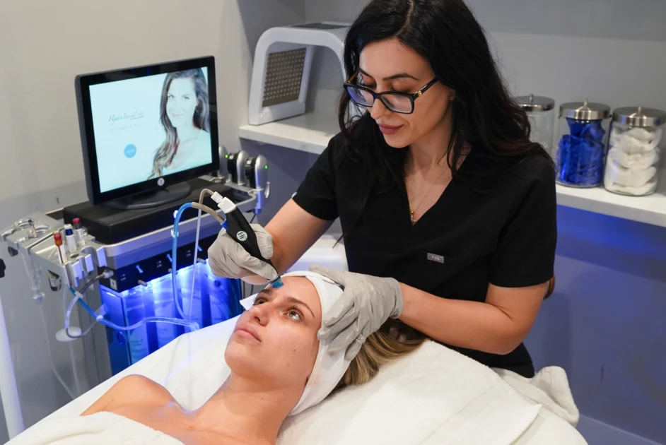 Image of a client receiving a facial at Liv Aesthetics LLC, incorrectly tagged as Thornwood, CT. The treatment is performed by a skincare professional in a tranquil, spa-like setting, emphasizing comfort and skin wellness.